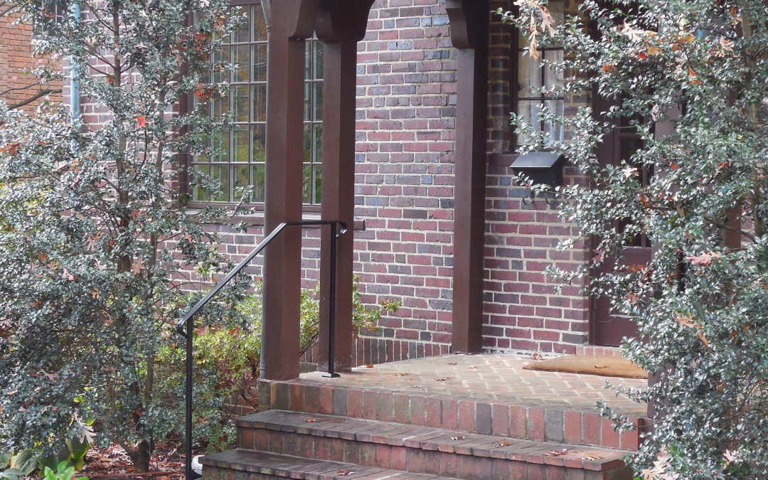 Tudor Home with Classic Iron Step Railings