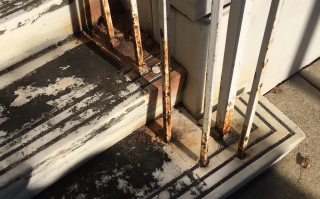 rusty railing needs historic restoration 